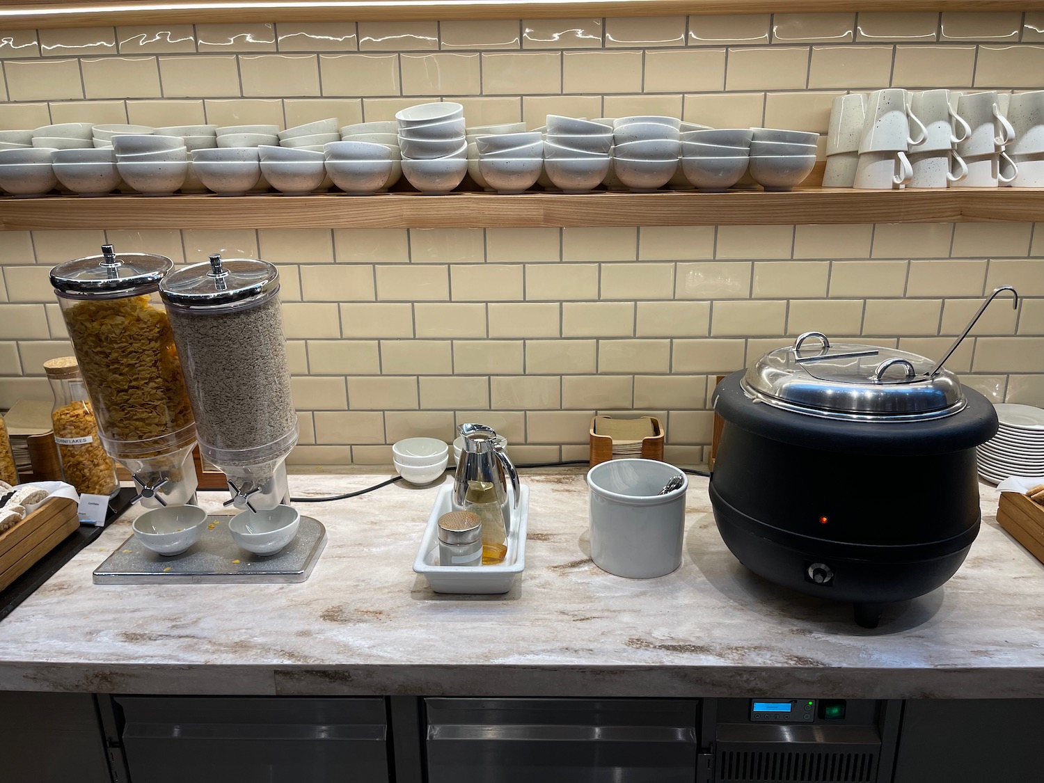 a kitchen counter with a variety of bowls and bowls