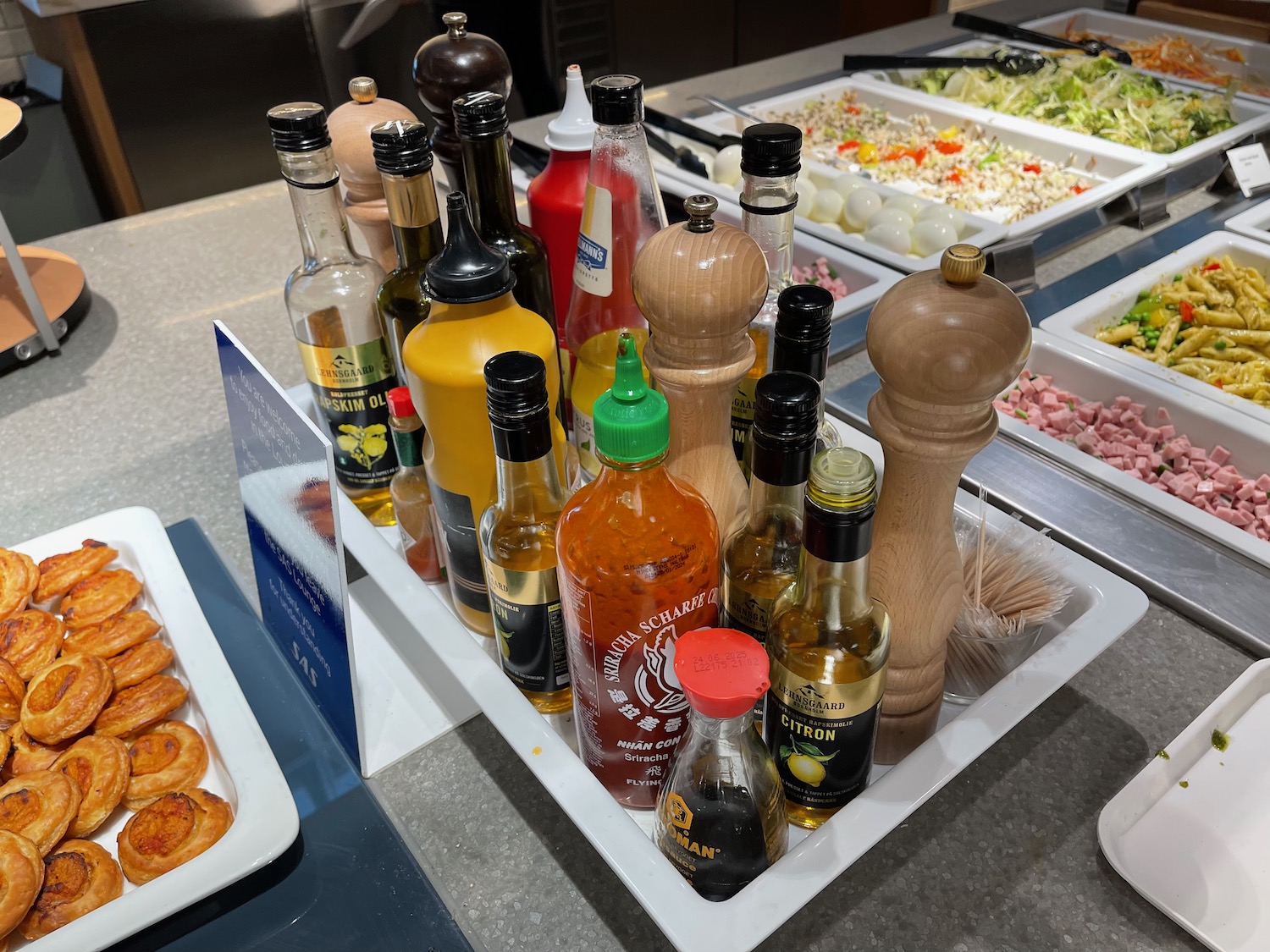 a tray of condiments and food