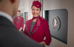 a woman in a red uniform