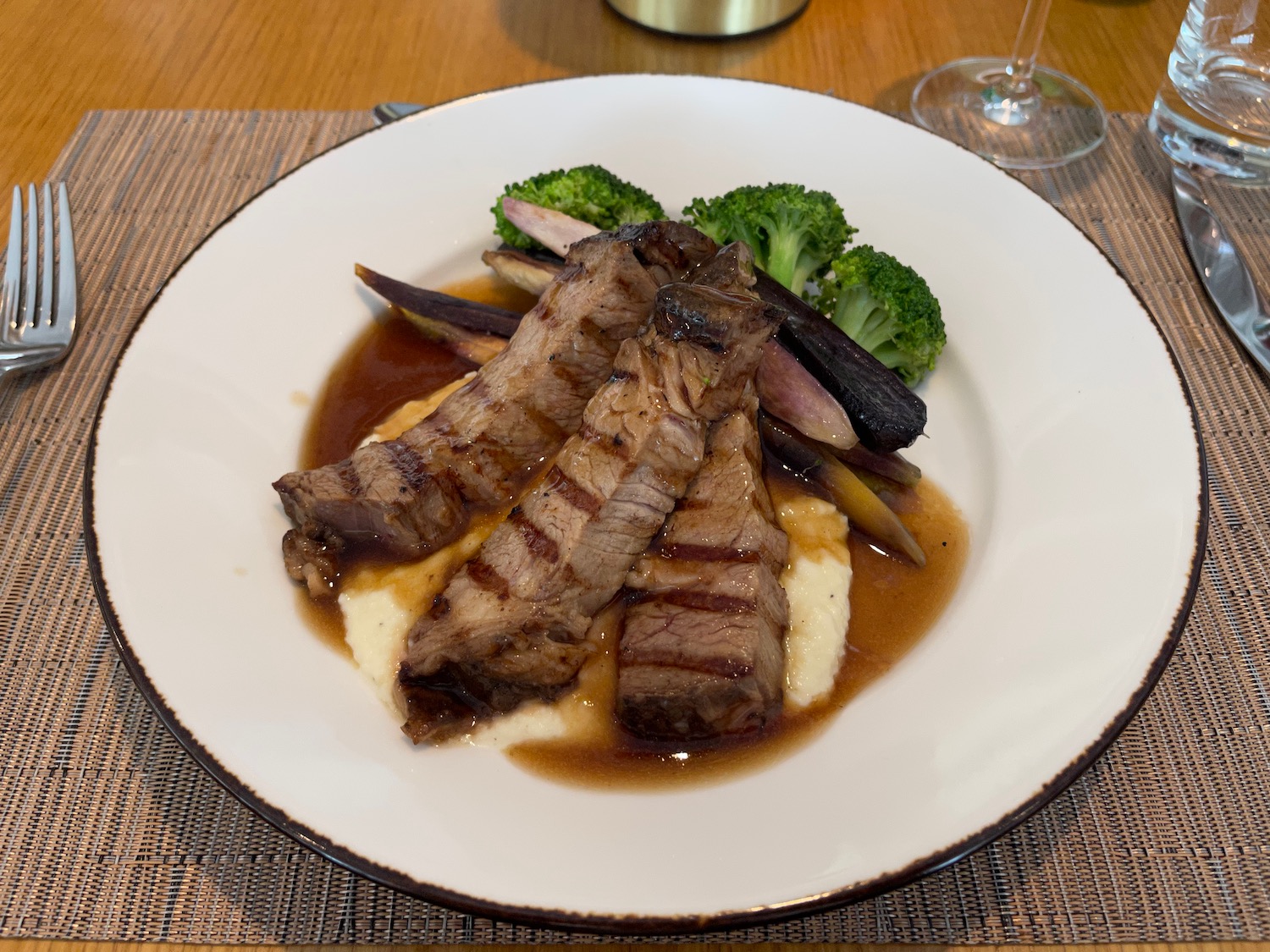 a plate of meat and vegetables