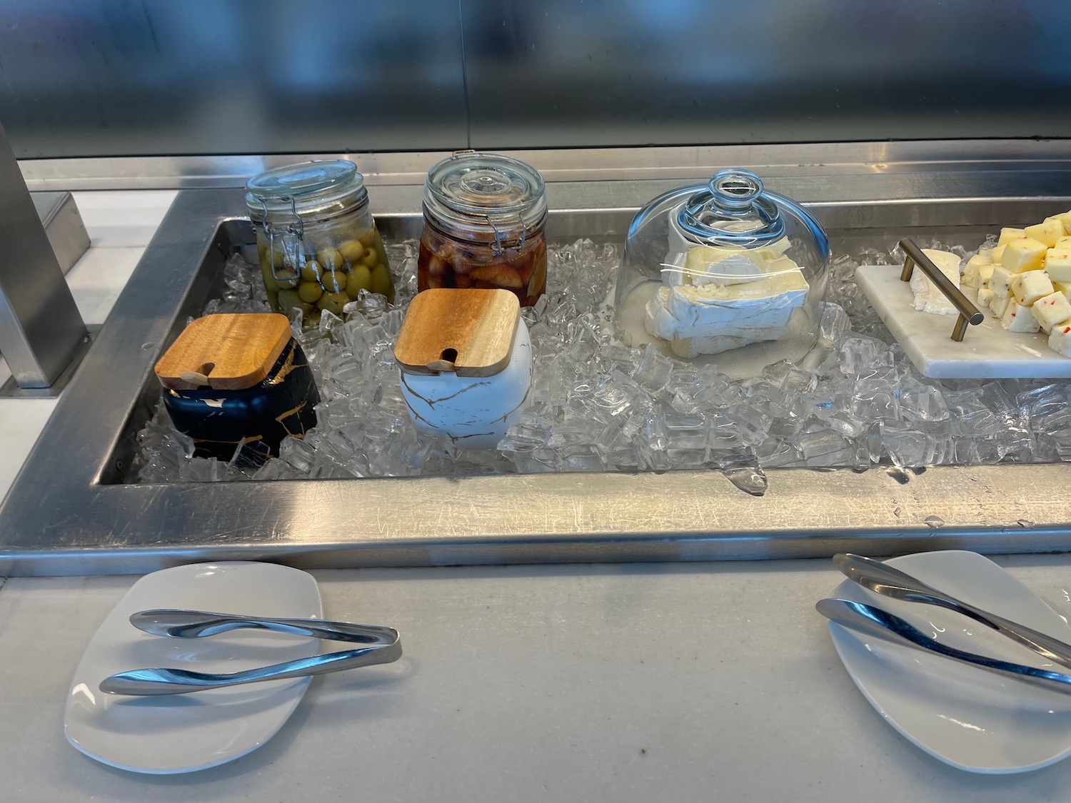 a metal tray with food on it