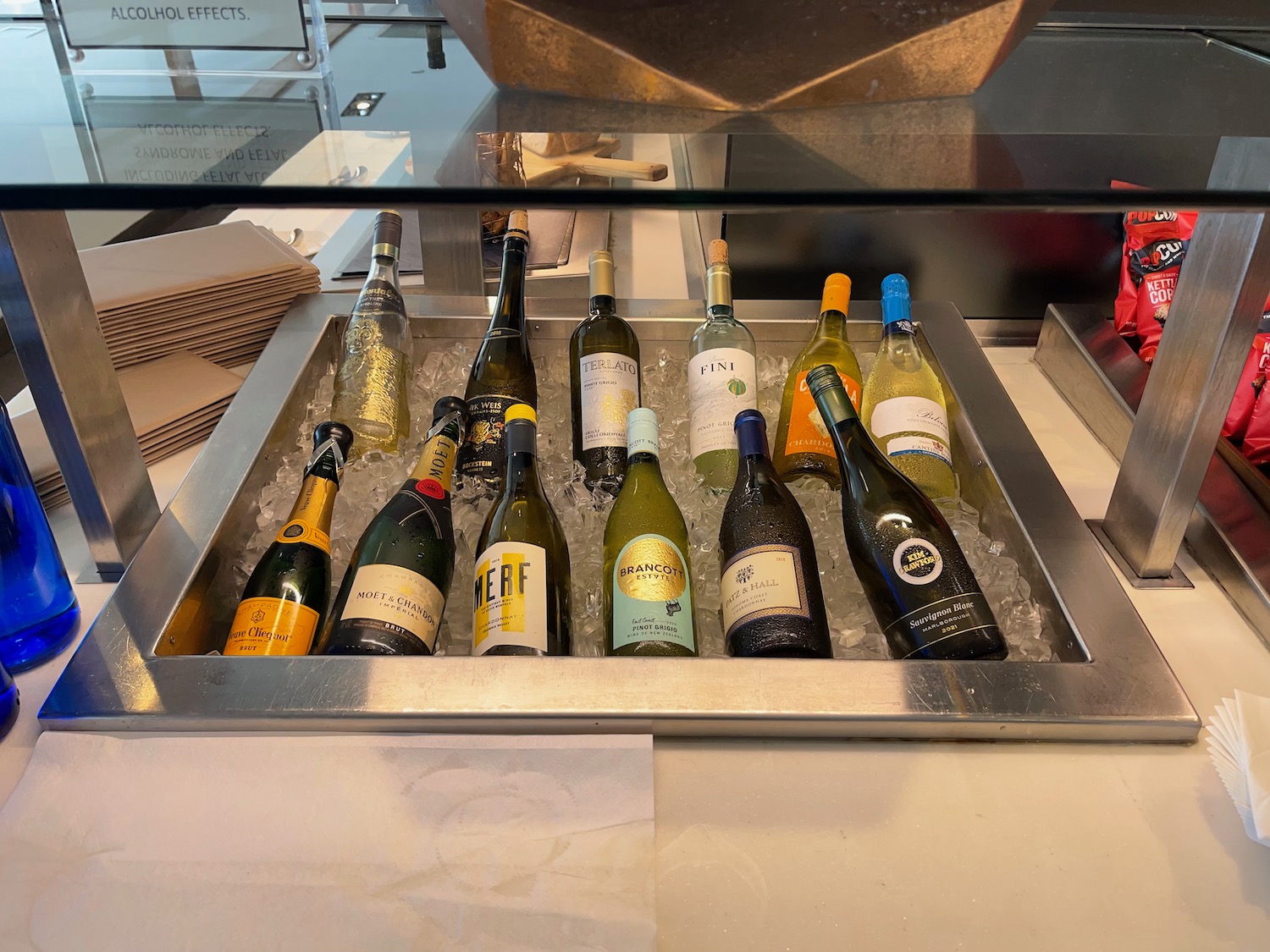 a group of bottles in a metal tray