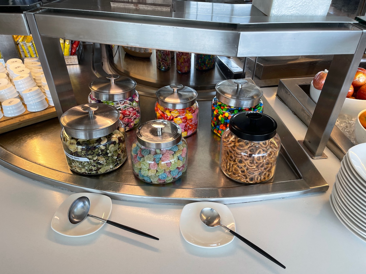 a group of glass jars with food on a counter