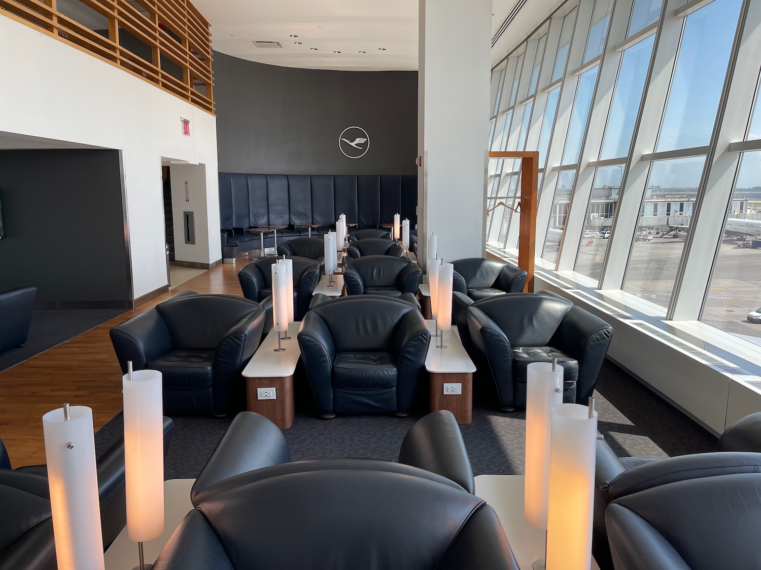 a room with black chairs and tables