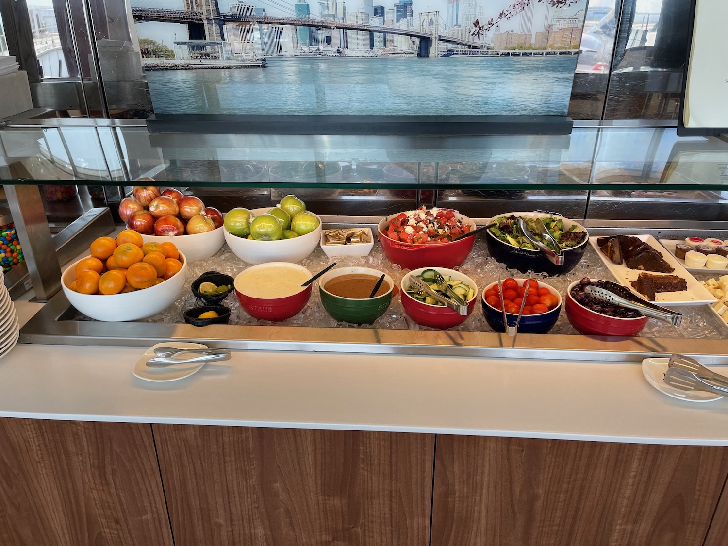 a buffet with fruit and vegetables