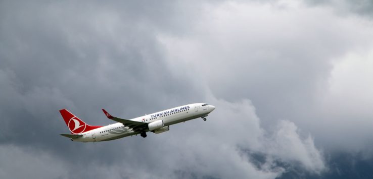 a plane flying in the sky