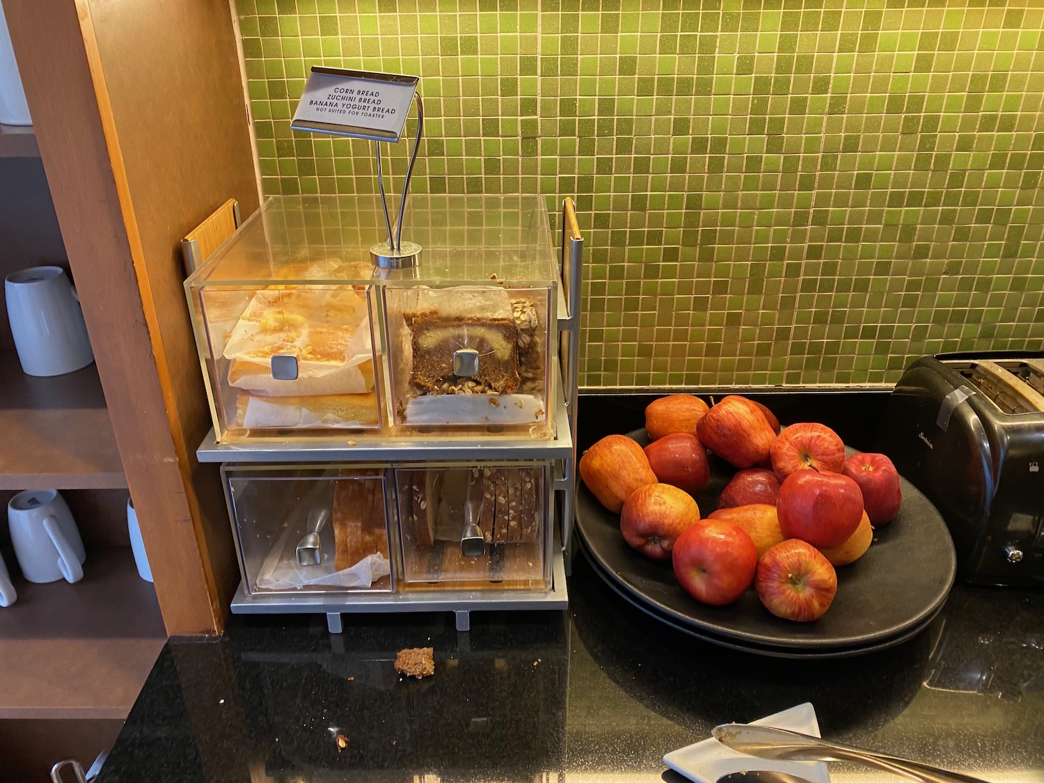 a tray of apples and a tray of bread