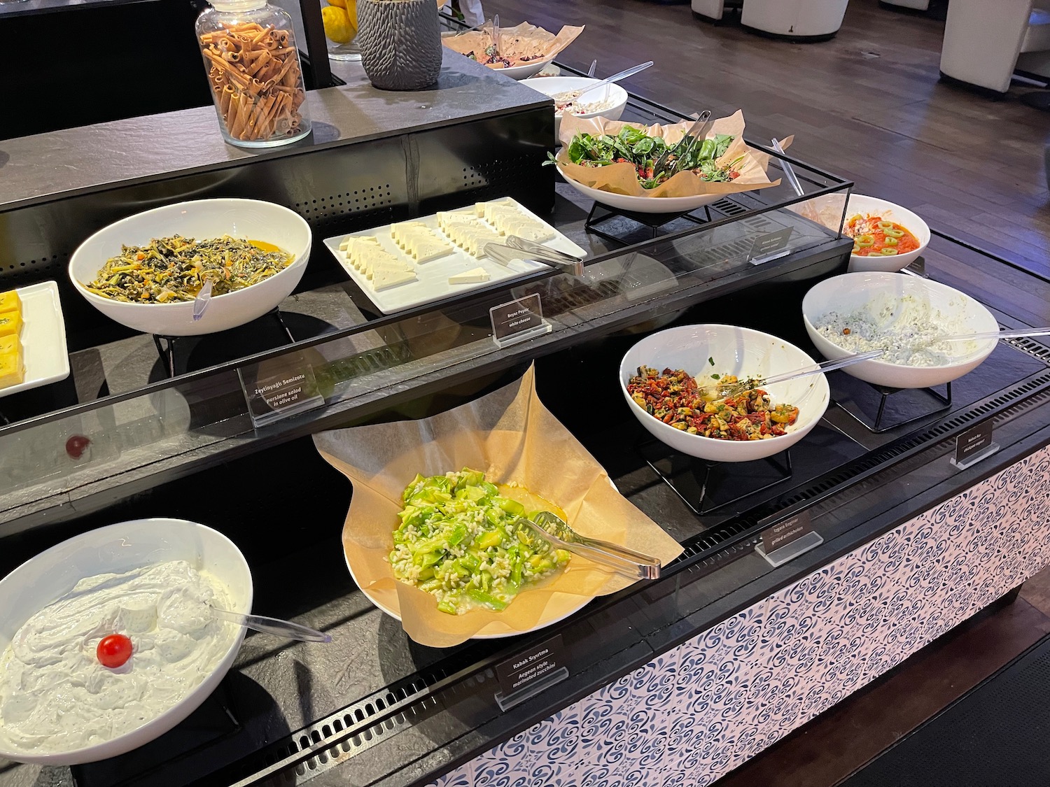 a buffet with different food items on it