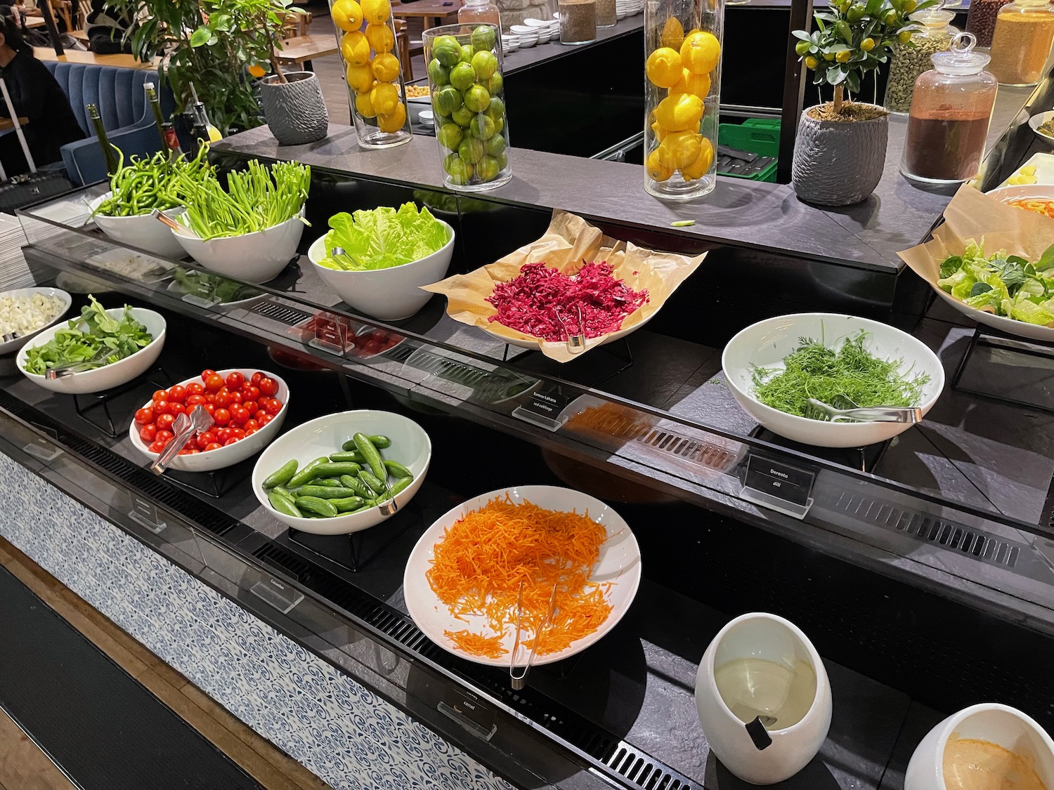 a salad bar with different types of vegetables