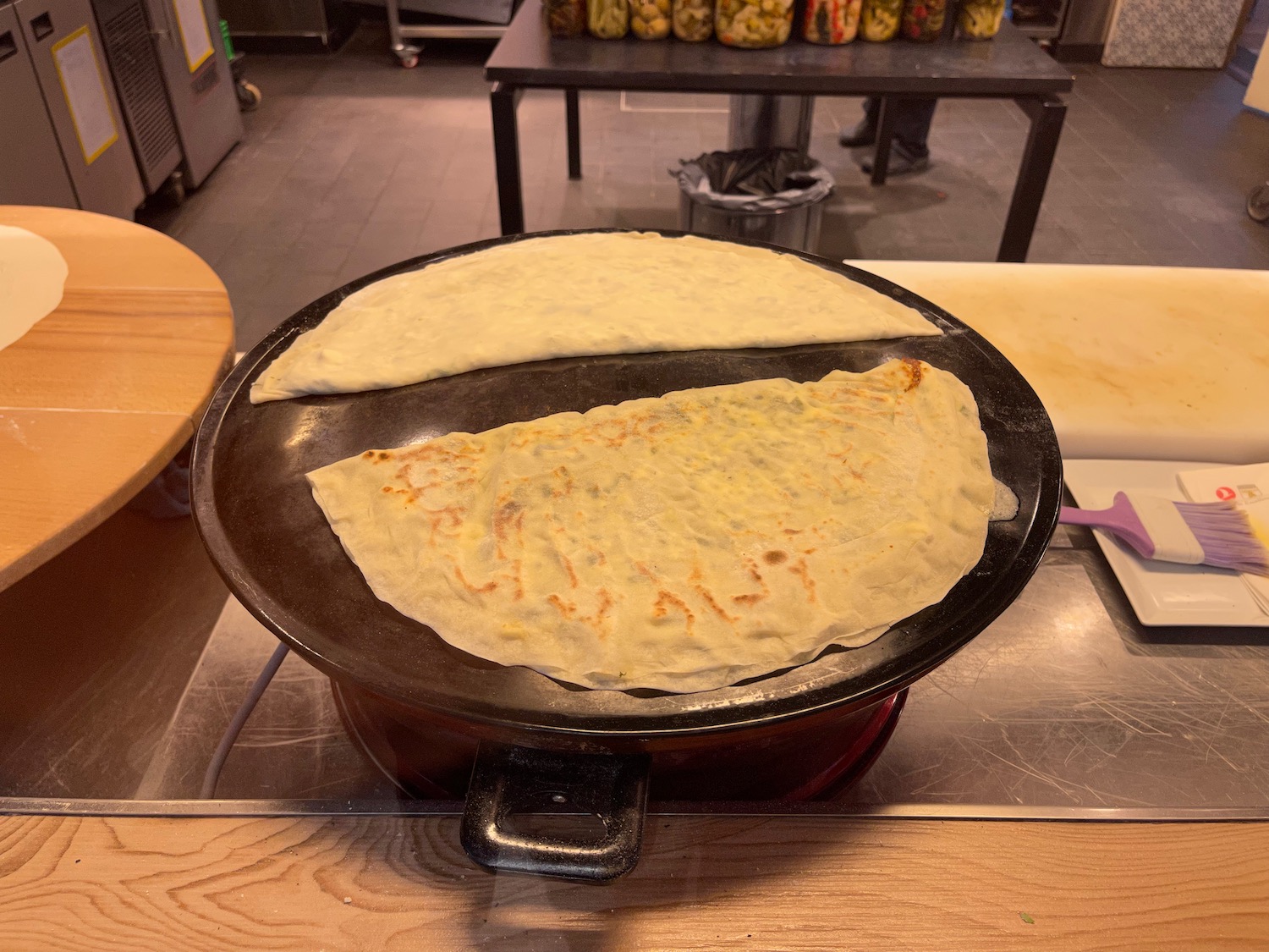 a pancake cooking on a stove