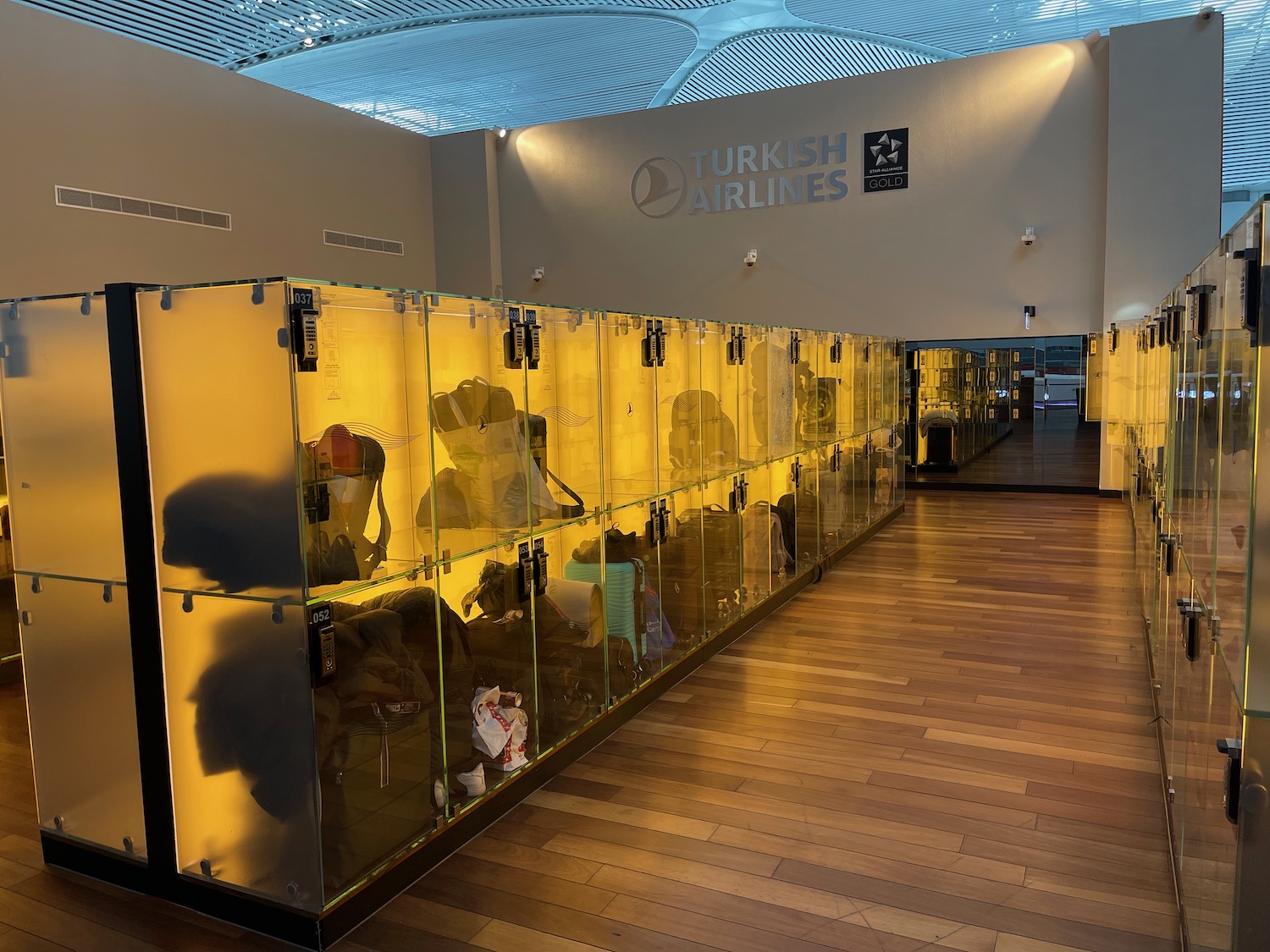 a glass cases with luggage inside