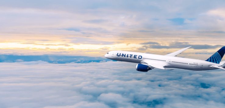 a plane flying above the clouds