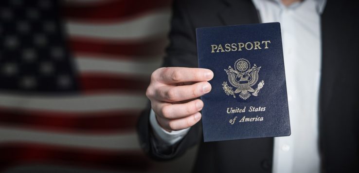 a person holding a passport