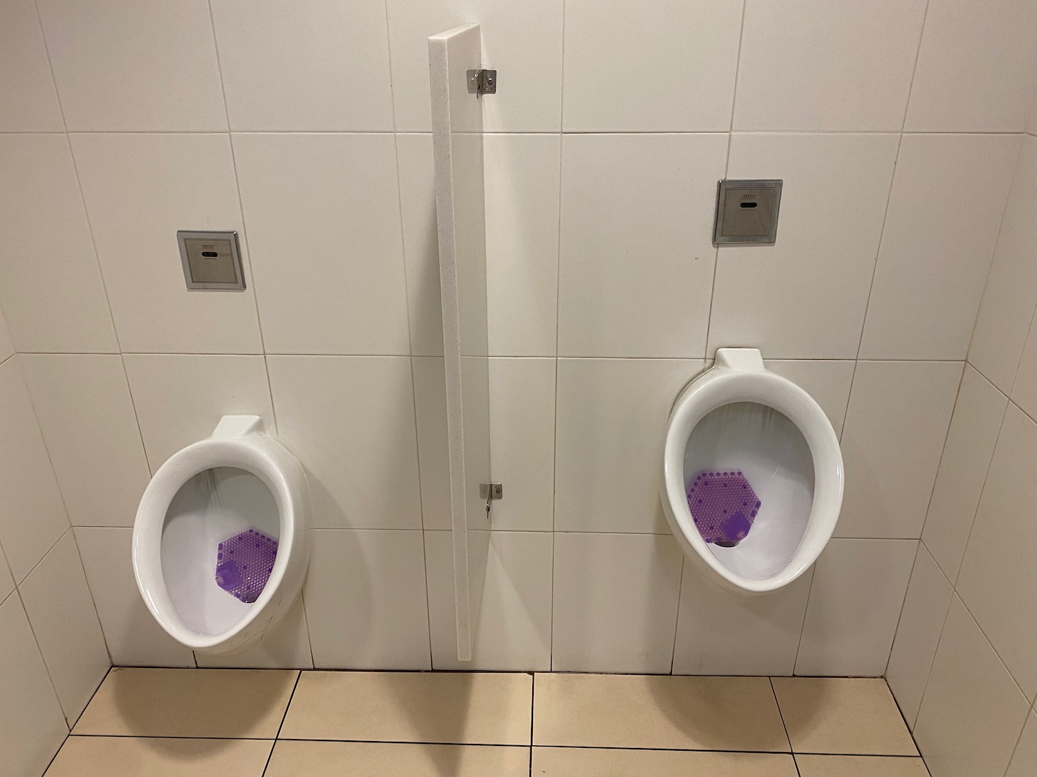 a urinals in a bathroom