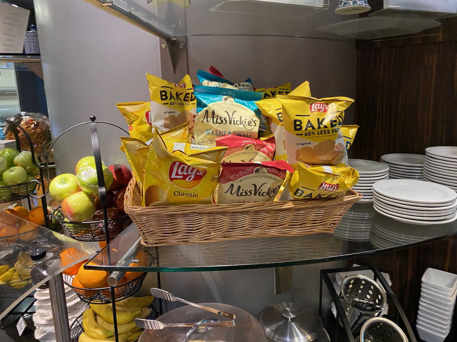 a basket of chips and other snacks
