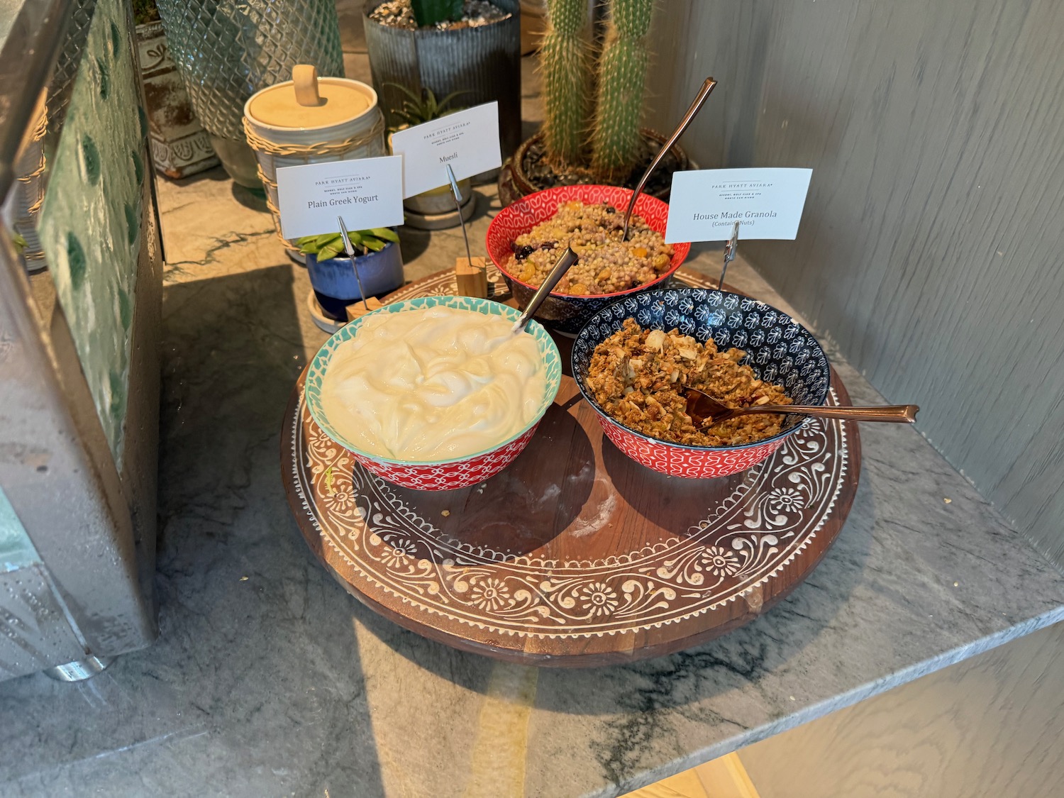 a group of bowls of food on a table