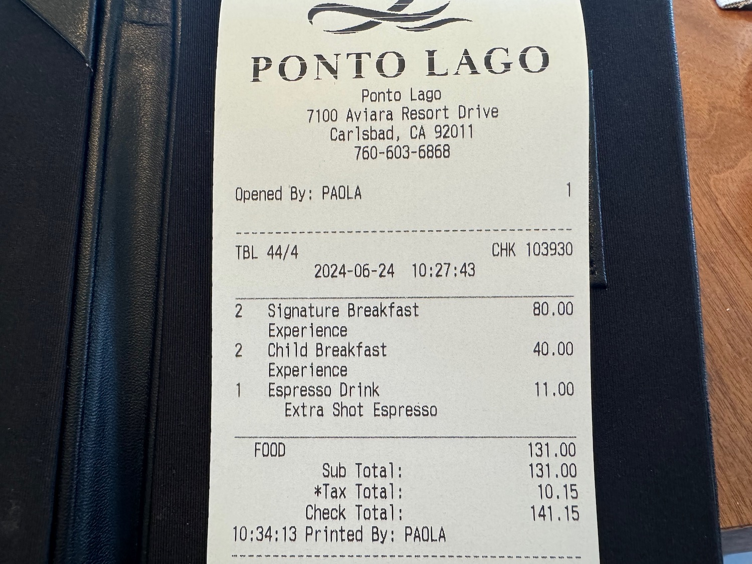 a receipt on a leather case