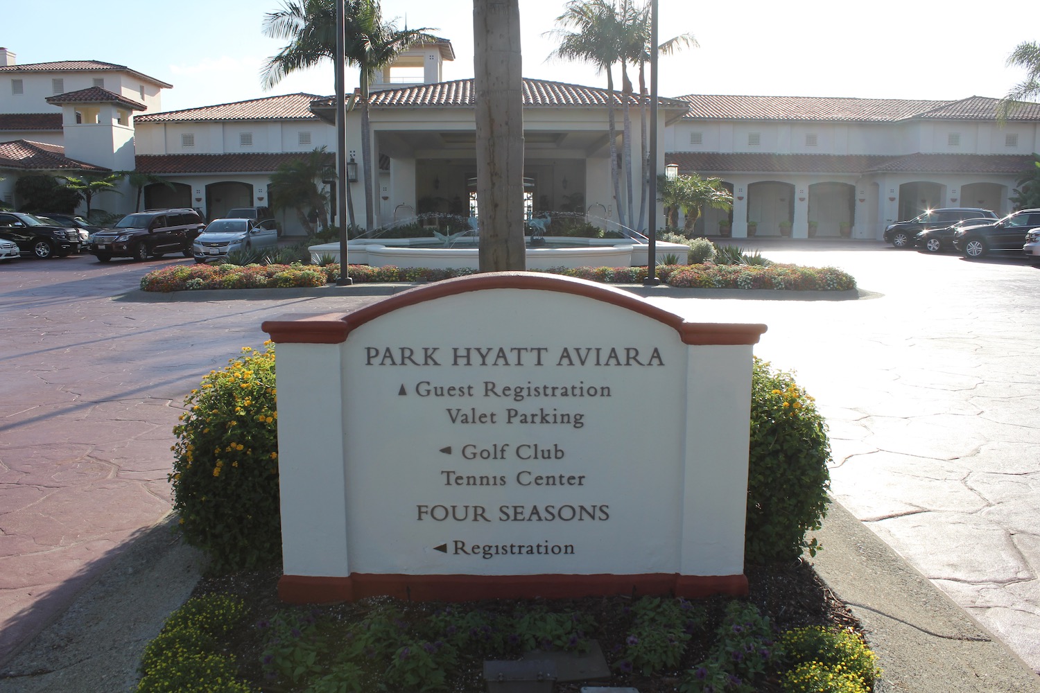 a sign in front of a building