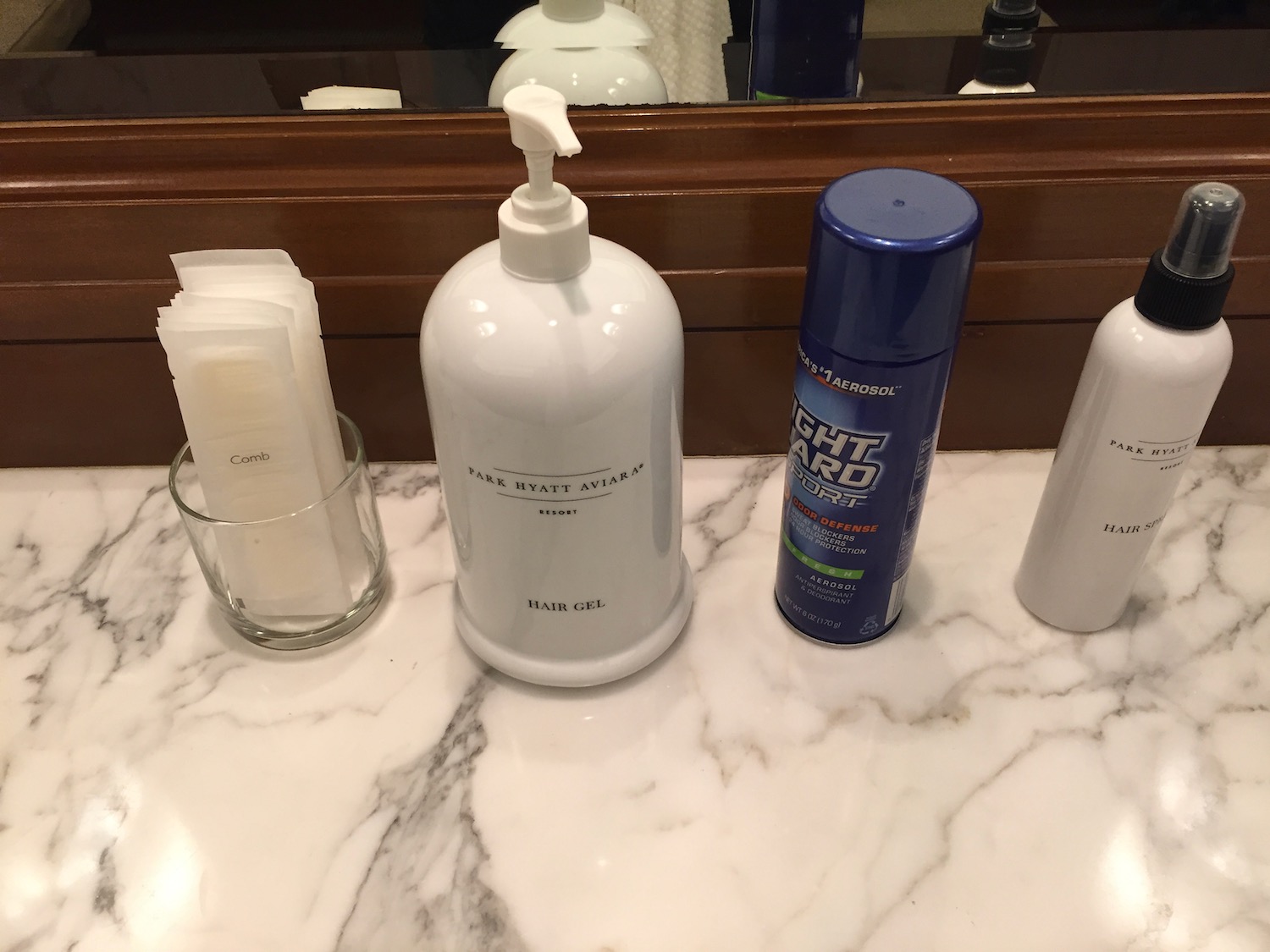 a group of personal hygiene products on a marble counter