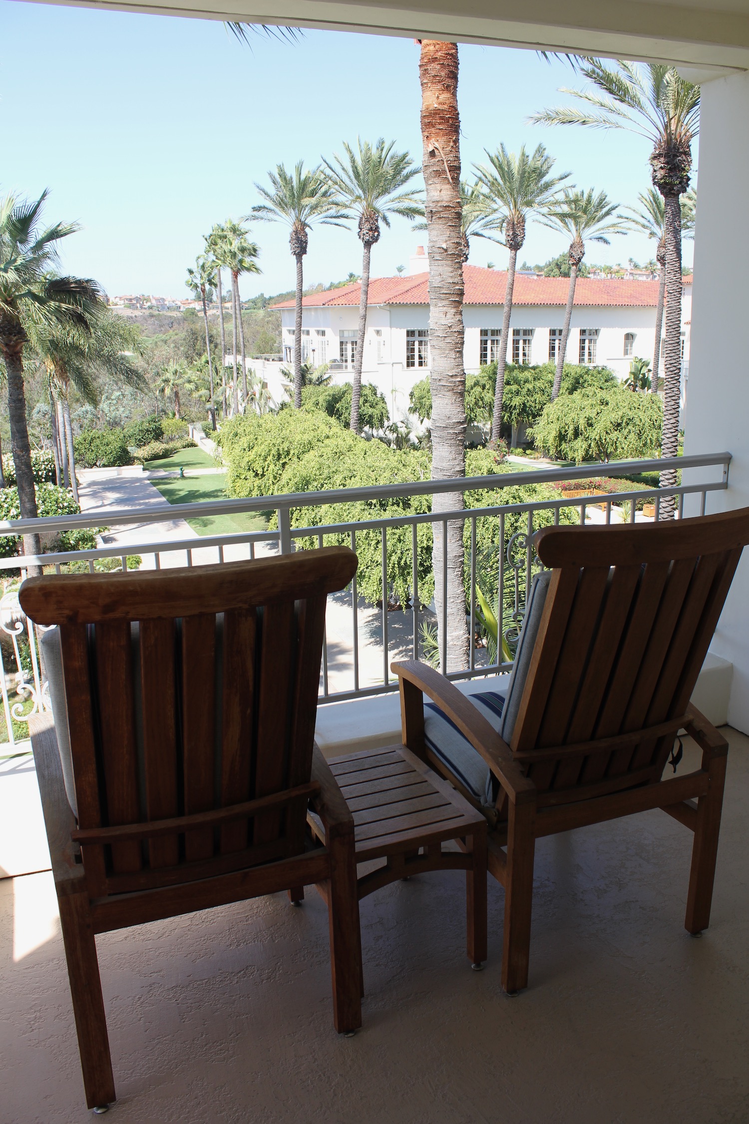 two chairs on a balcony