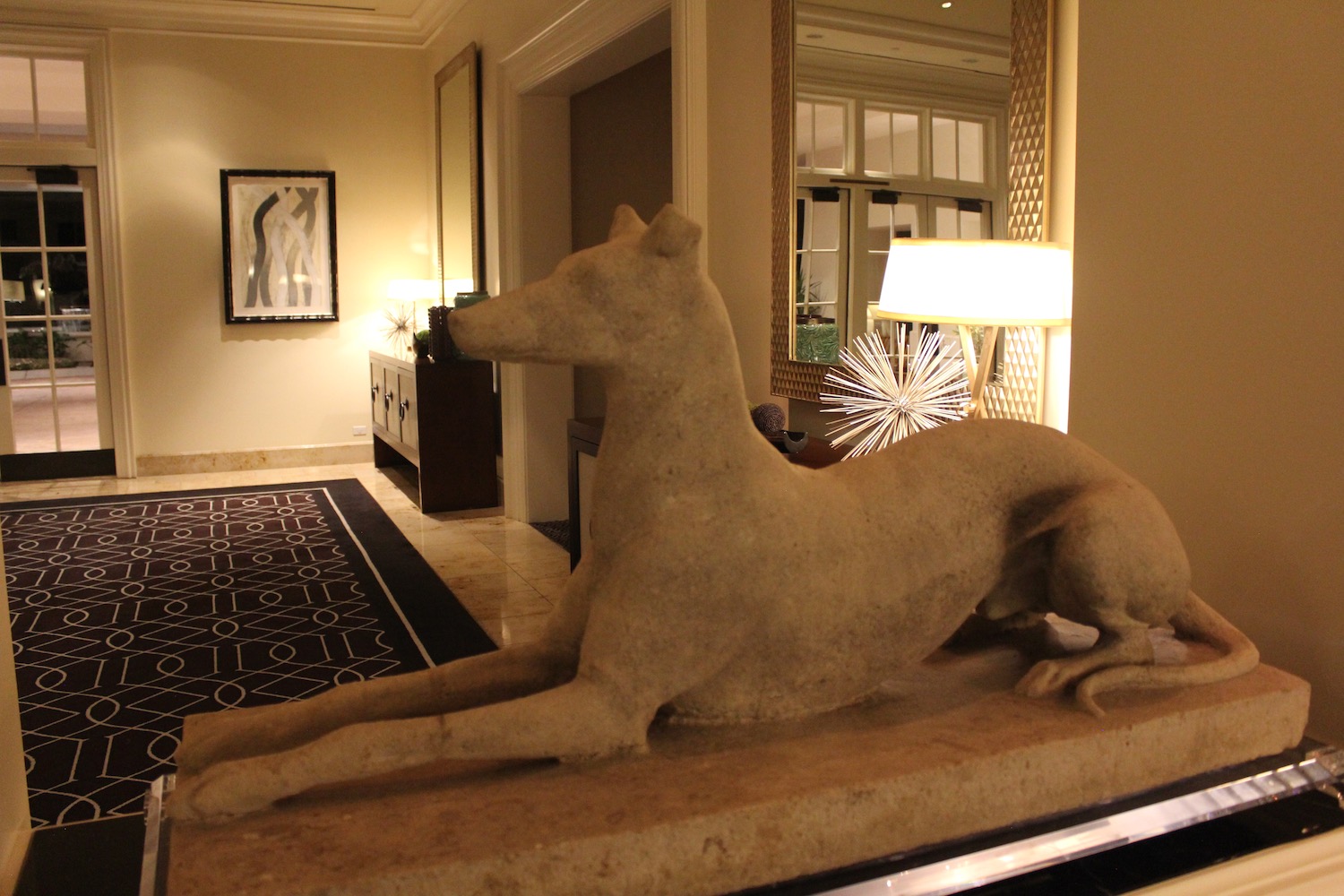 a statue of a dog in a room
