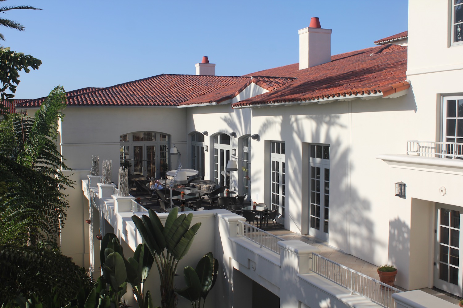 a white building with a red roof