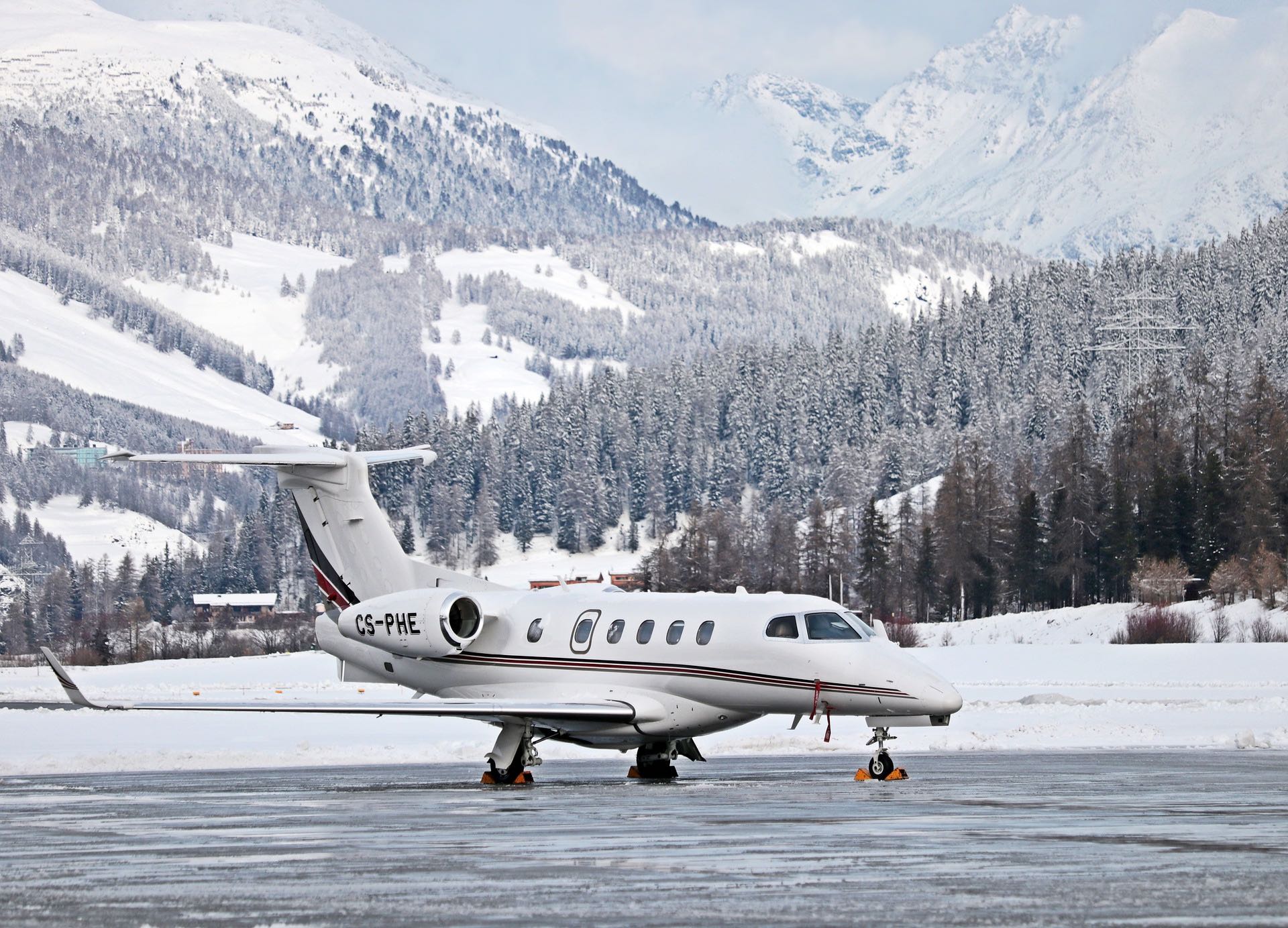 a plane on the ground in the snow