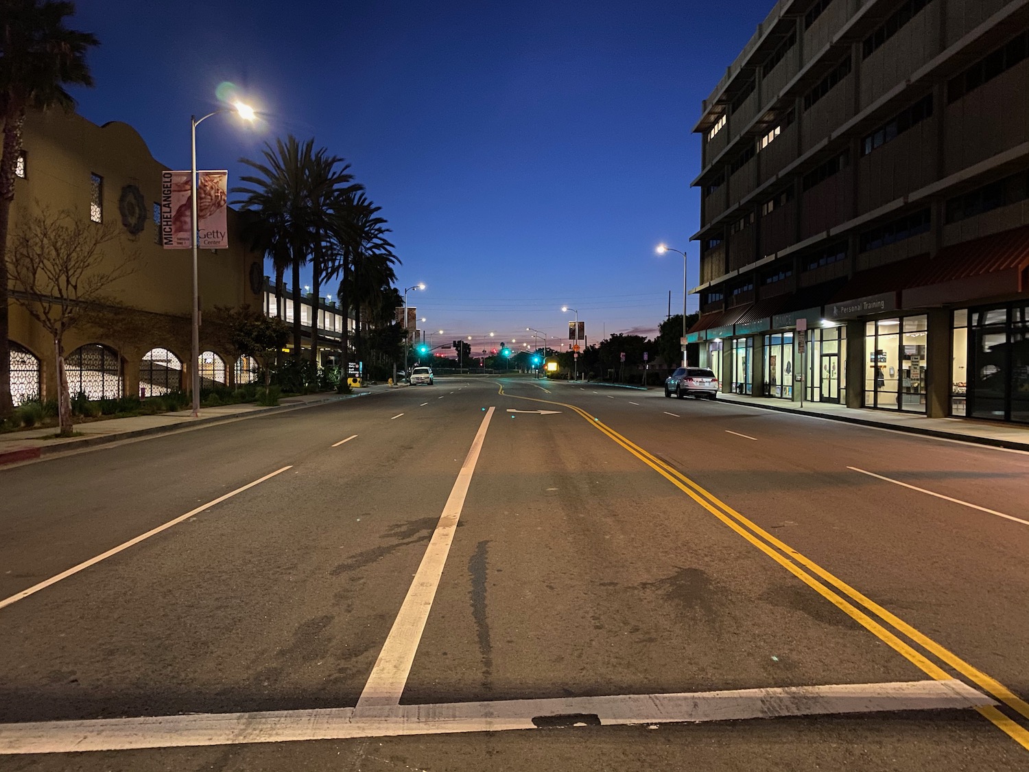 a street with buildings and trees