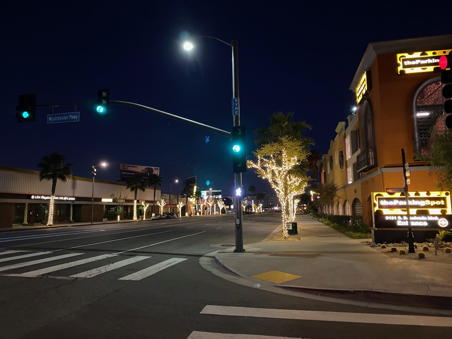 a street with a green light on it