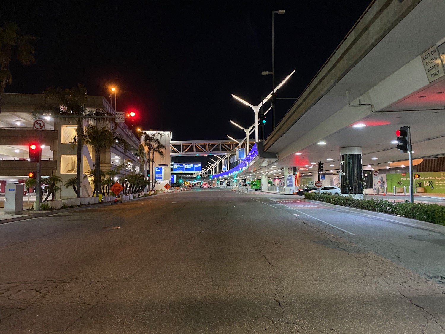 a street with buildings and lights