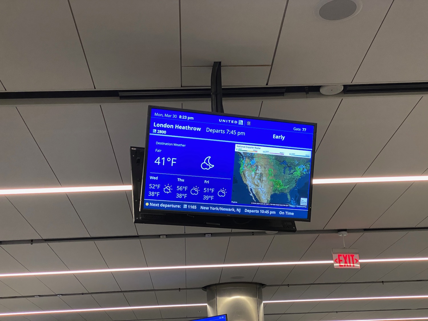 a screen with weather and temperature
