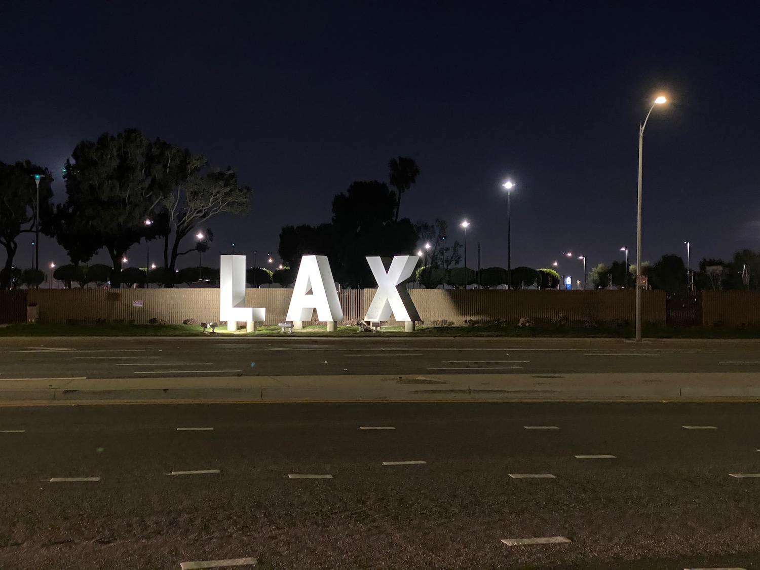 a large white sign on a road