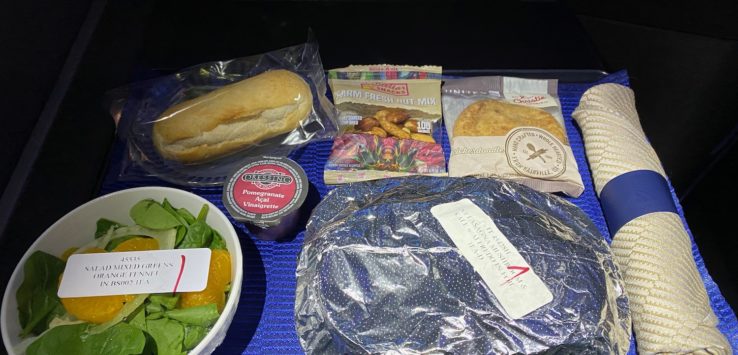 food on a tray in a plane