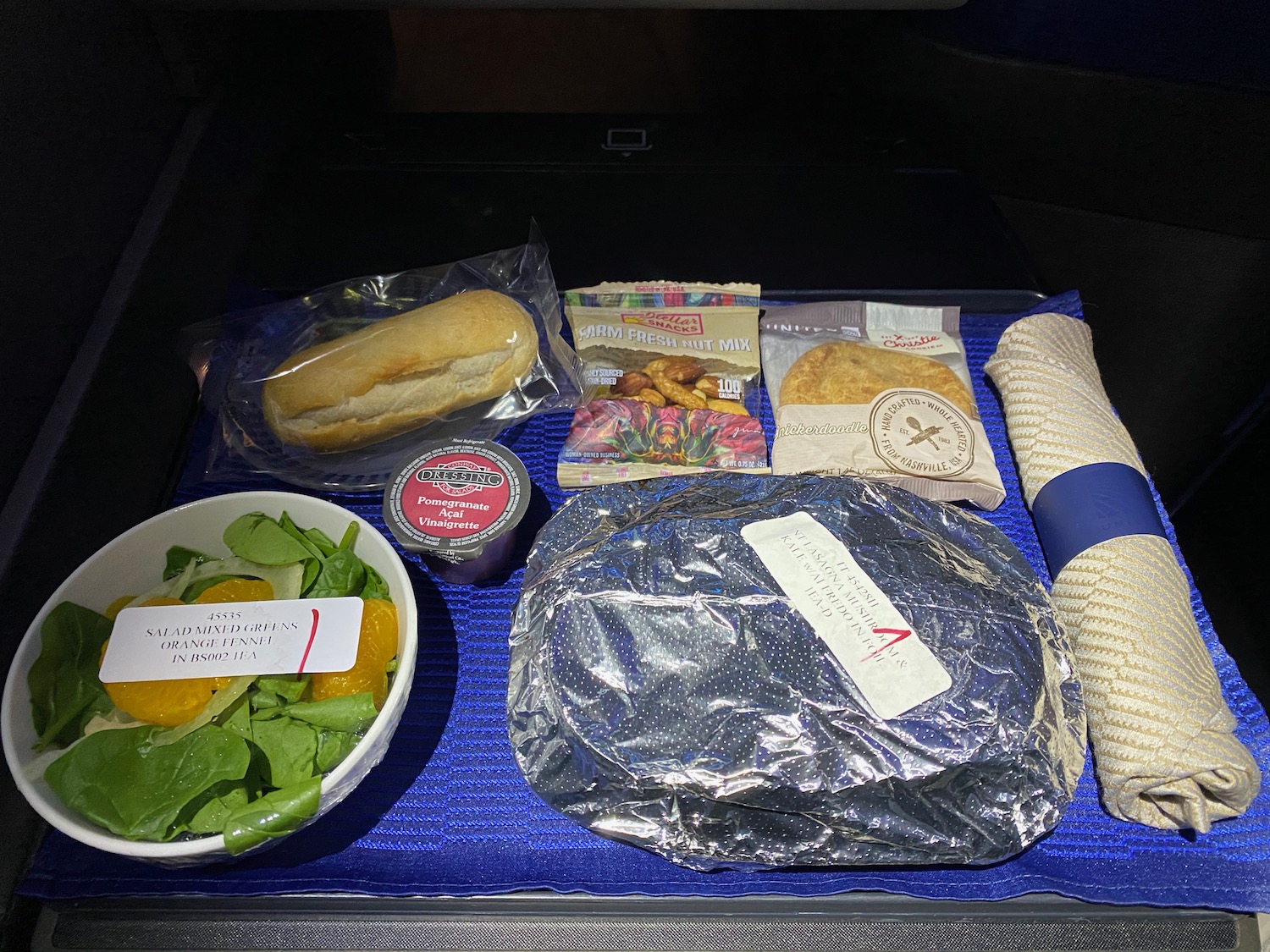 food on a tray in a plane