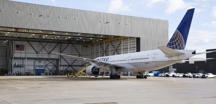 an airplane parked in a hangar