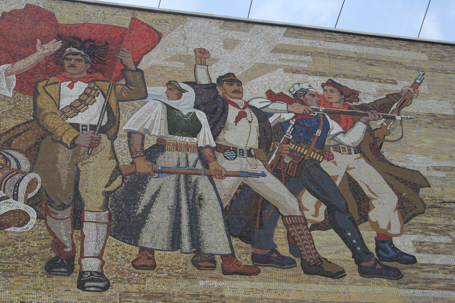 a mosaic of a group of people holding guns