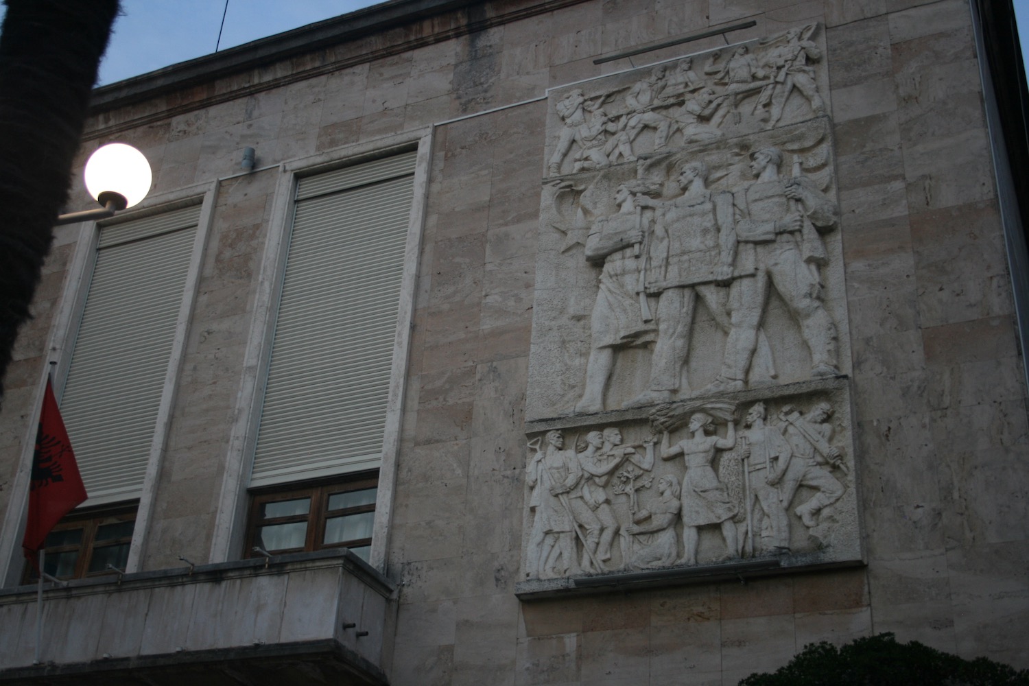 a stone relief on a building