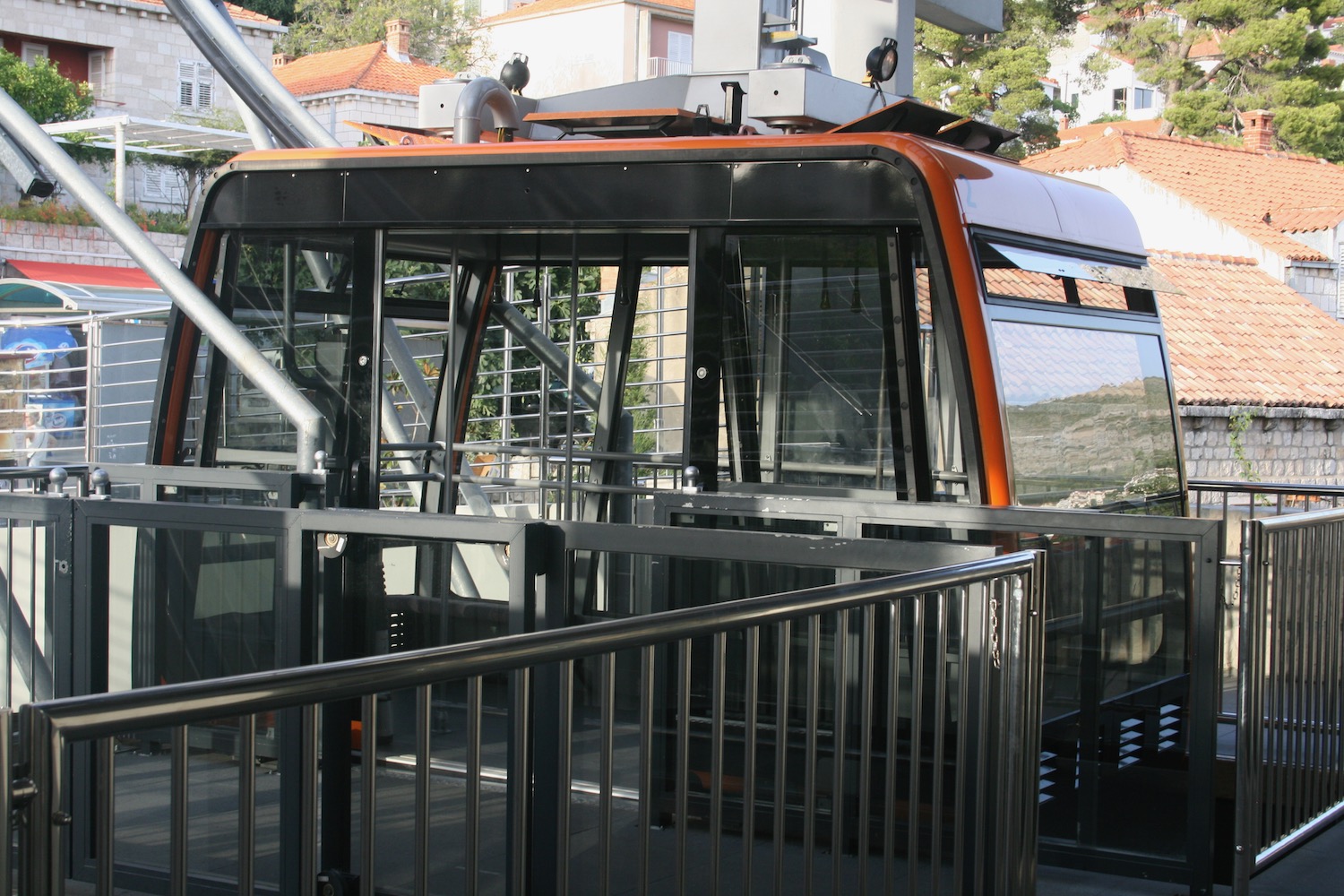 a cable car with a railing