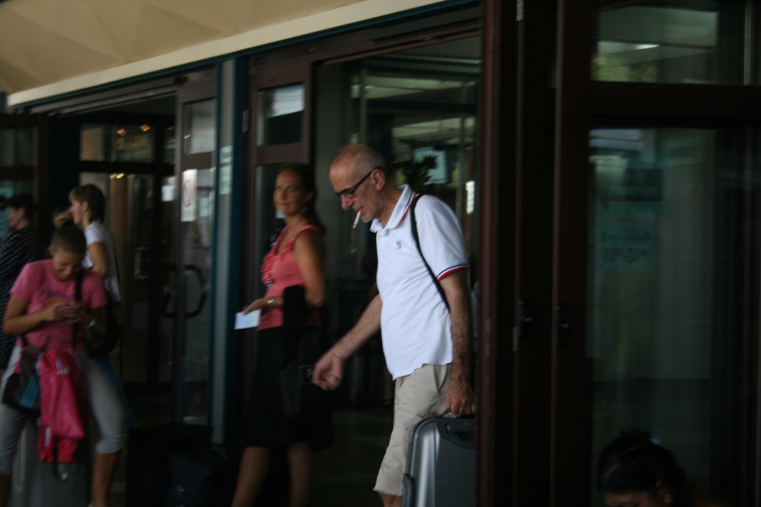 a man carrying a suitcase