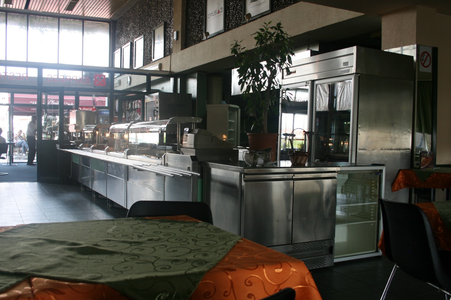 a restaurant with a large kitchen