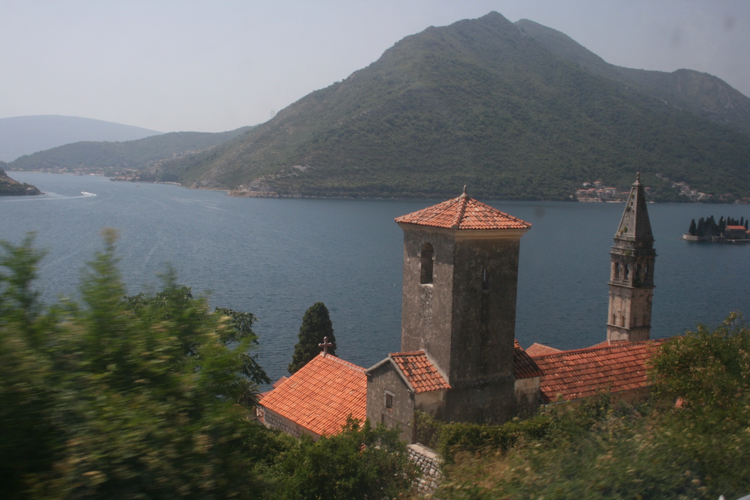 a building next to a body of water