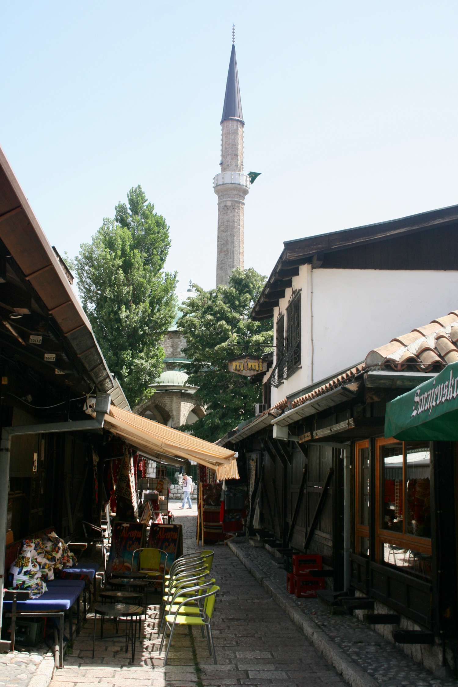 a street with a tower in the background