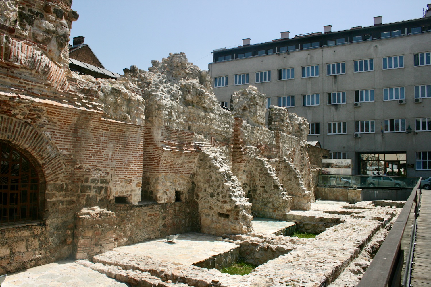 a stone building with a stone wall