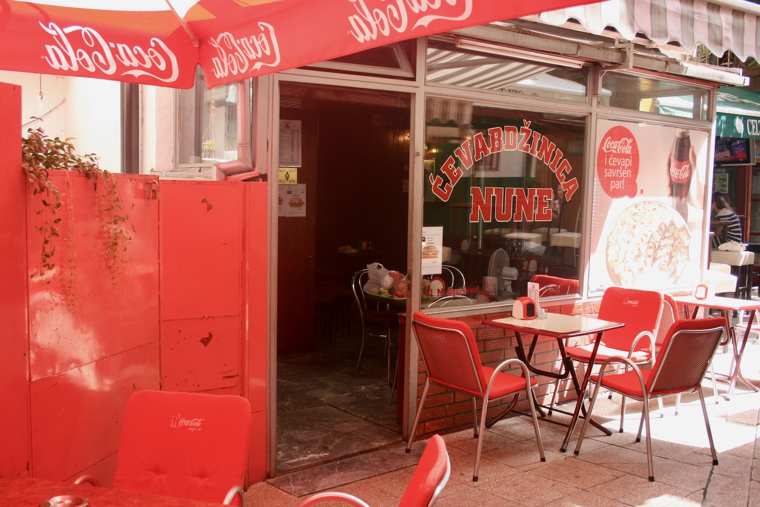 a restaurant with tables and chairs