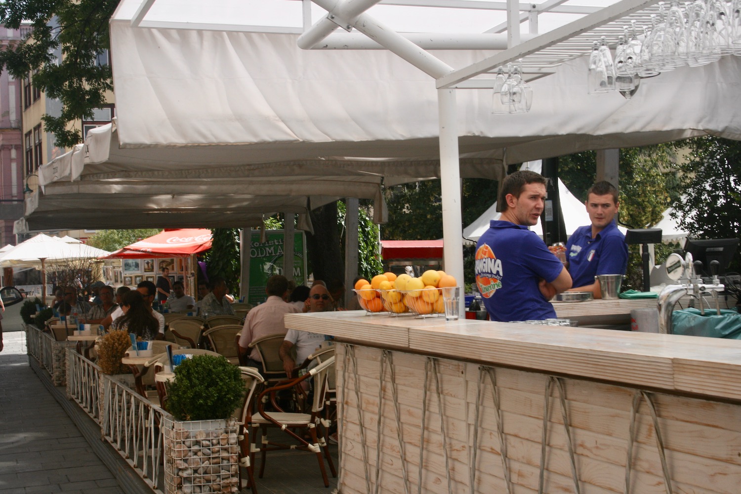 a group of people at a bar