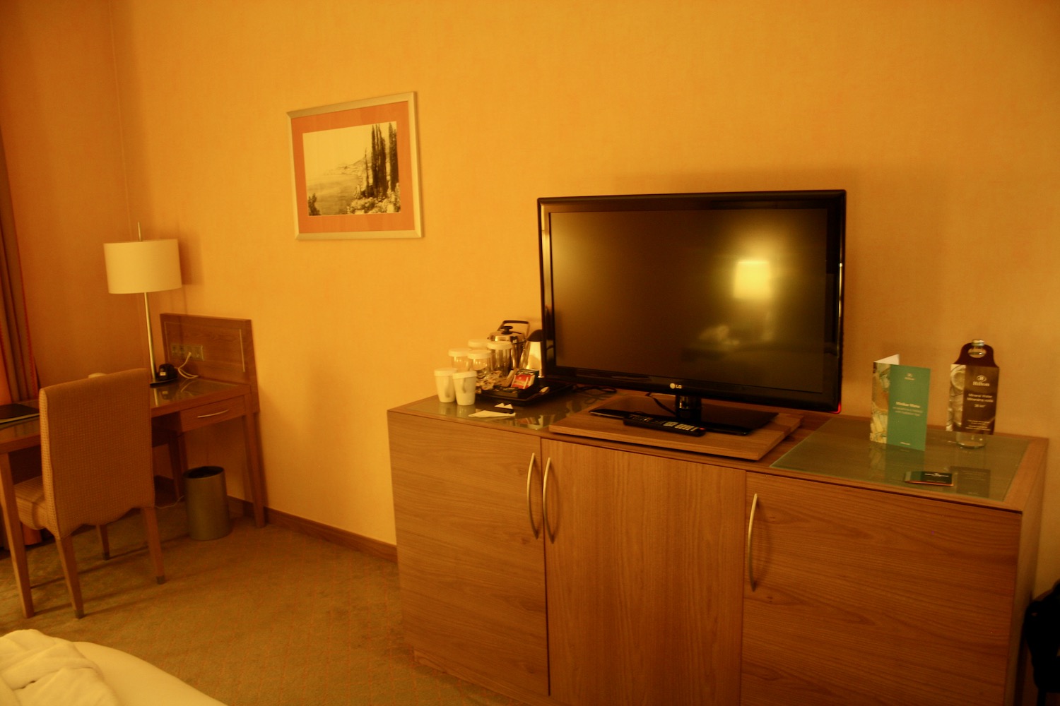 a tv on a cabinet in a room