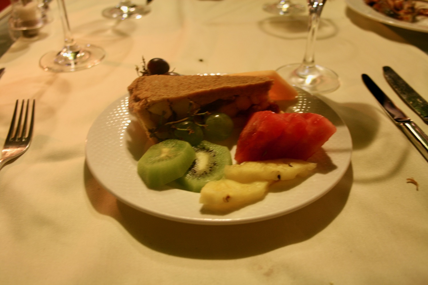 a plate of fruit and pie