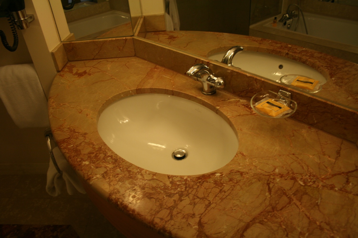 a bathroom sink with a mirror