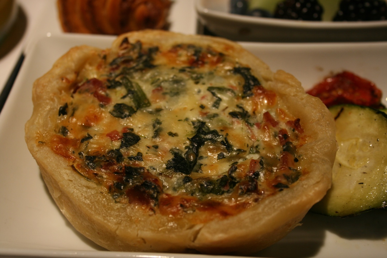 a small quiche on a plate