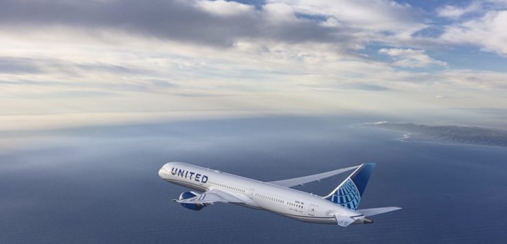 a plane flying over the ocean